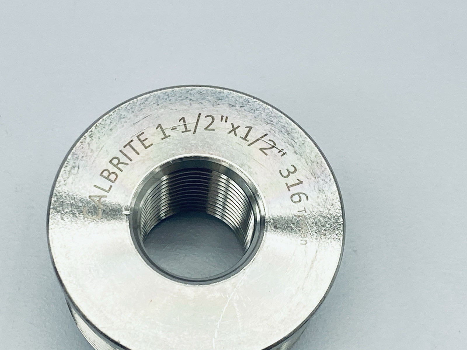 CALBRITE S61500FB05 Stainless Steel 316 1-1/2 X 1/2 SS316 Face Bushing NPT-NPSM
